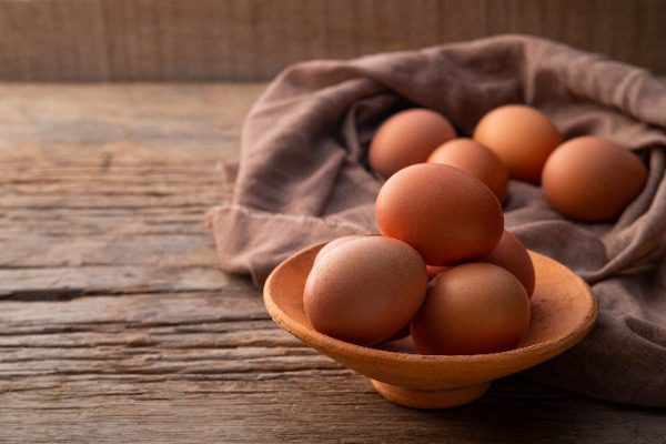 Eggs in clay bowl.