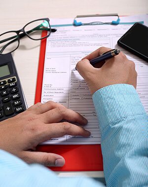 Man Filling Out Forms